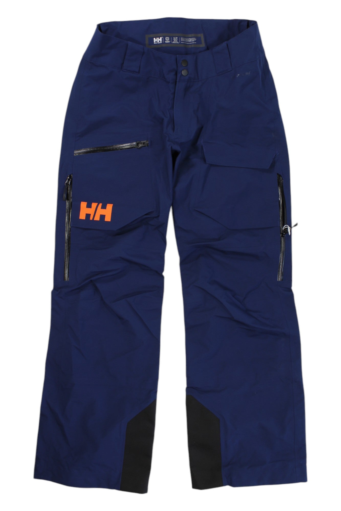 A pair of Helly Hansen Mens Ridge Infinity Shell Pants in blue with black knee patches, zippered pockets, an orange HH logo on the left thigh, belt loops, and a button waist closure.