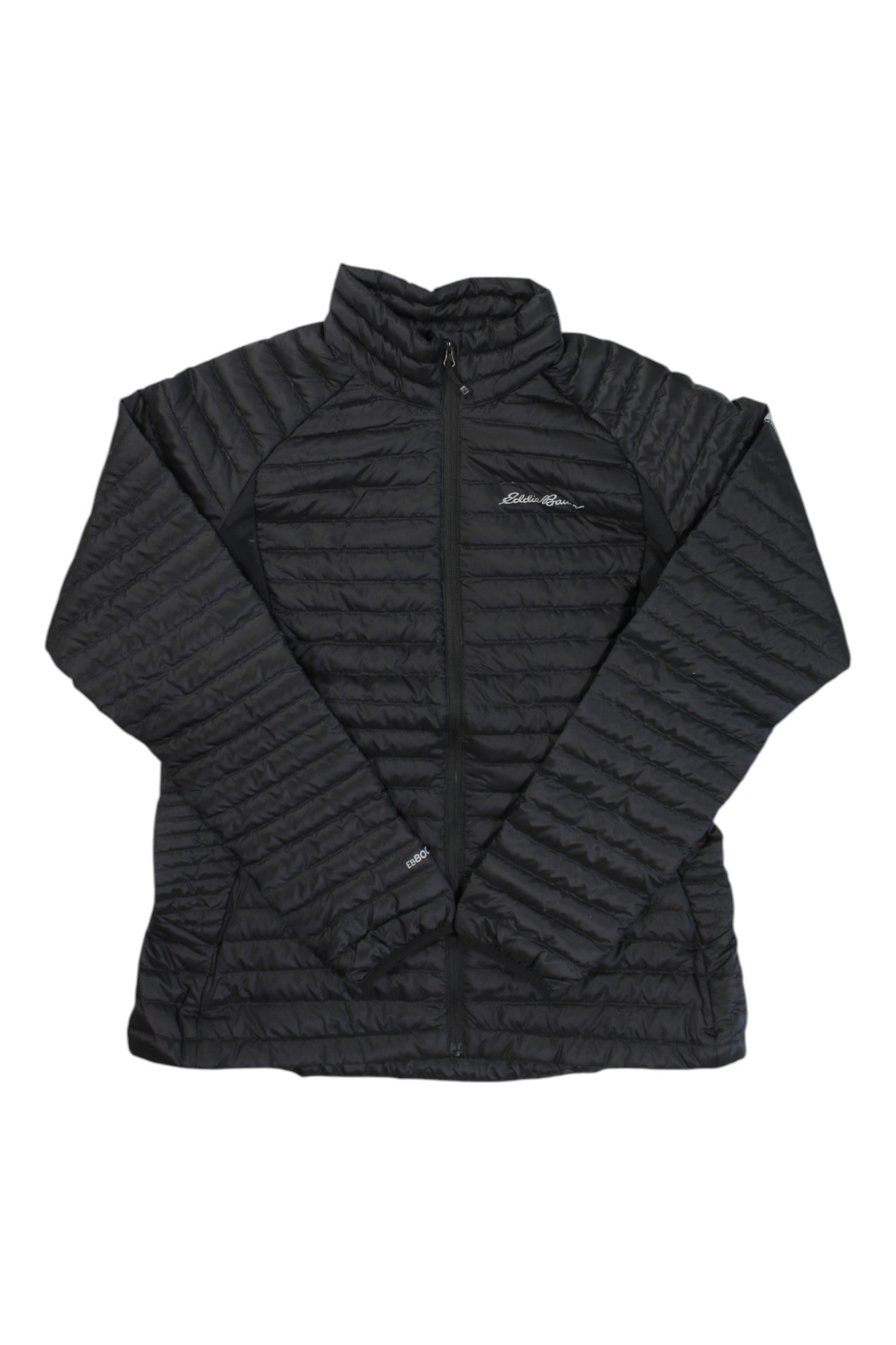 The Eddie Bauer Women's Microtherm 2.0 Down Jacket is black, quilted, lightweight, and puffy with a front zipper, stand-up collar, long sleeves, and the Eddie Bauer logo on the left chest.