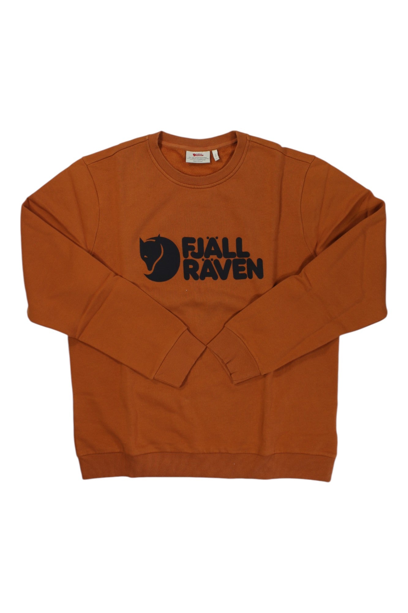 The Fjallraven Mens Logo Sweater in burnt orange, made from organic cotton, features a black Fjällräven logo and stylized fox head printed on the front. Ideal for outdoor adventures.