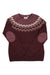 The Fjallraven Womens Ovik Knit Sweater features a maroon base, white and light pink zigzag pattern, orange dots, and maroon elbow patches—ideal for cozy style and comfort on the hiking trail.