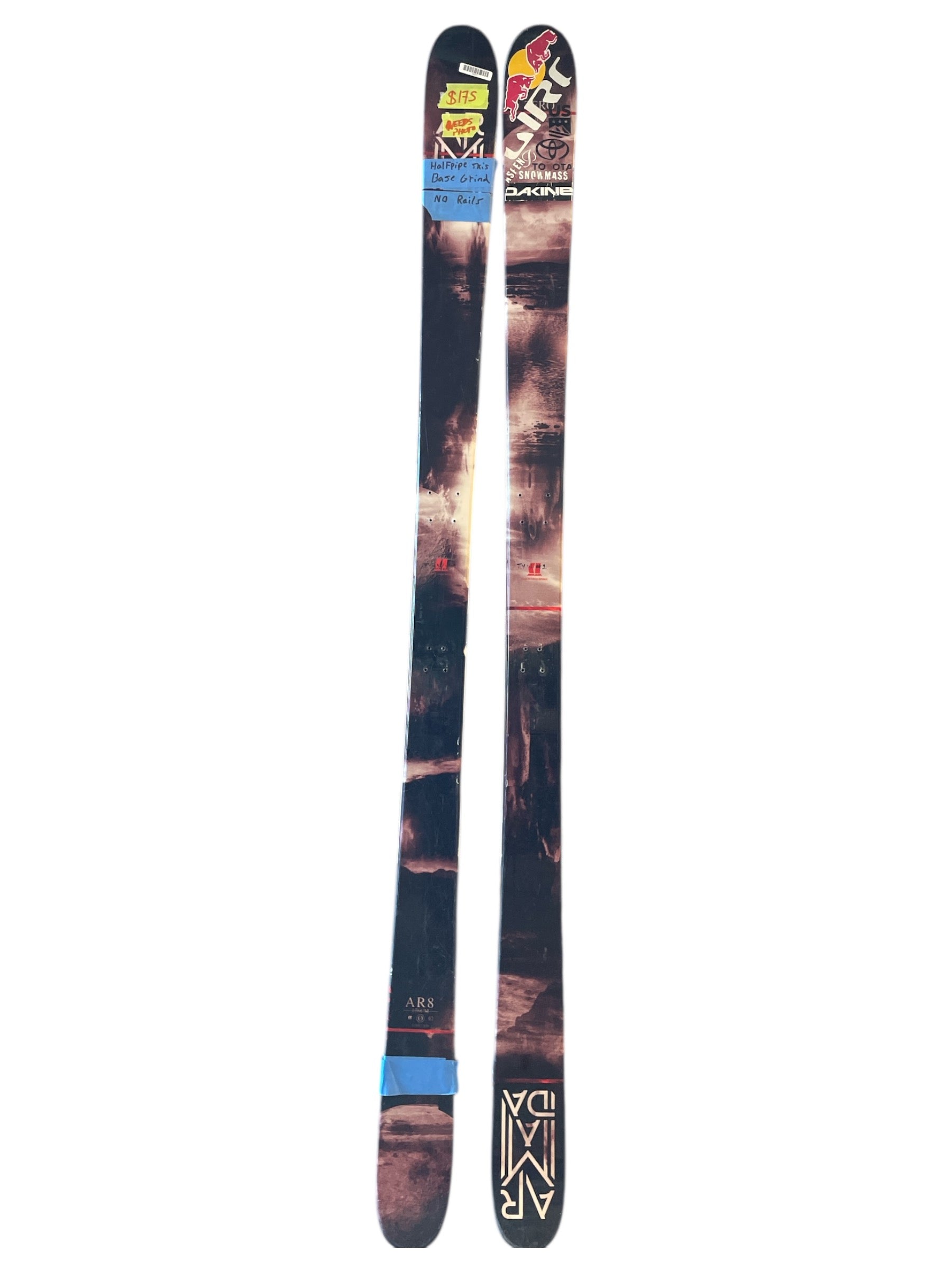 A pair of Armada Ar8 Skis - 2019, featuring dark colors with graphic logos, text, and mountain scenery designs, are displayed side by side against a white background.
