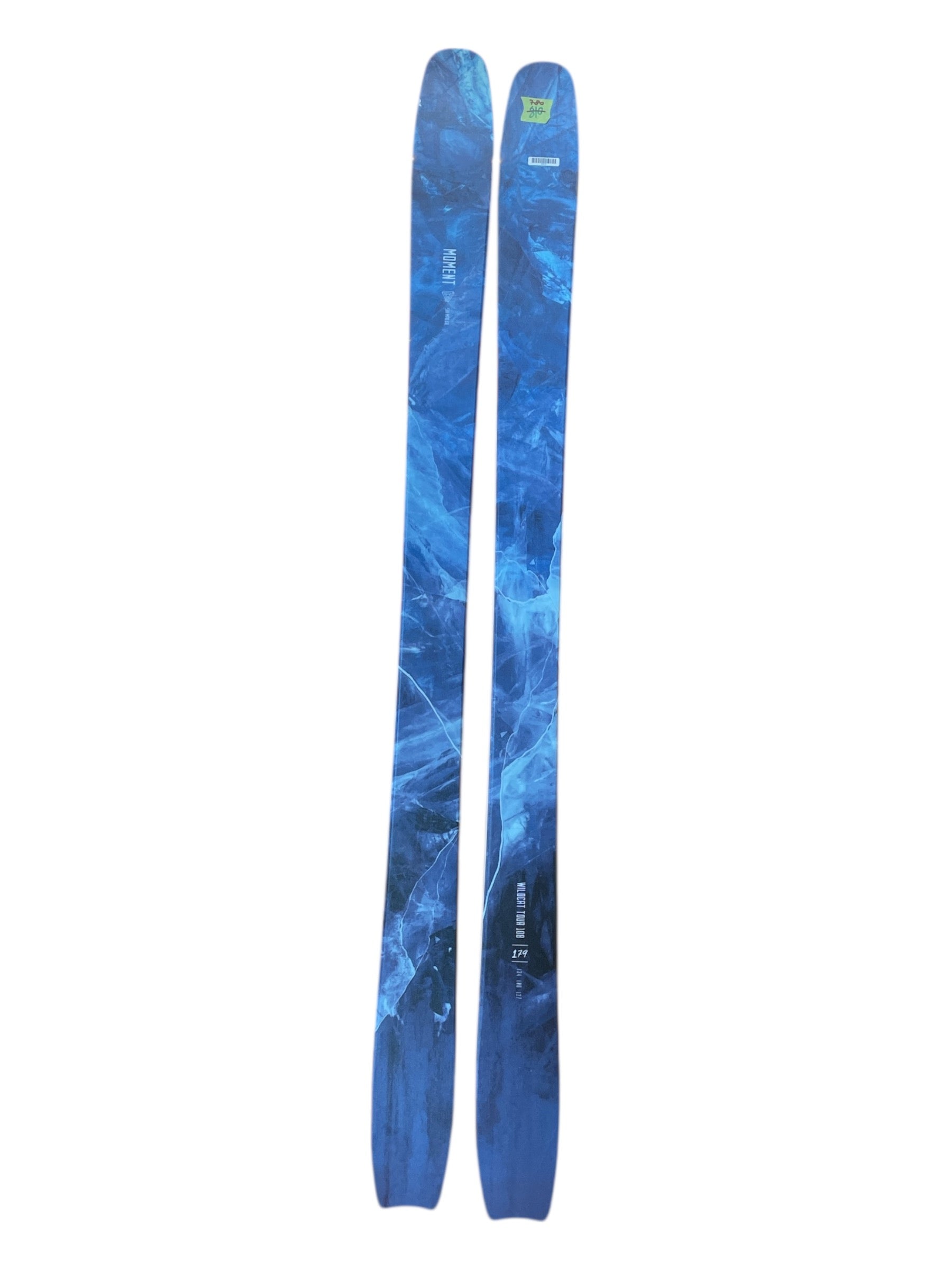 A pair of Moment Wildcat Tour 108 Ski '23 in blue with a marbled icy pattern are displayed side by side on a white background.