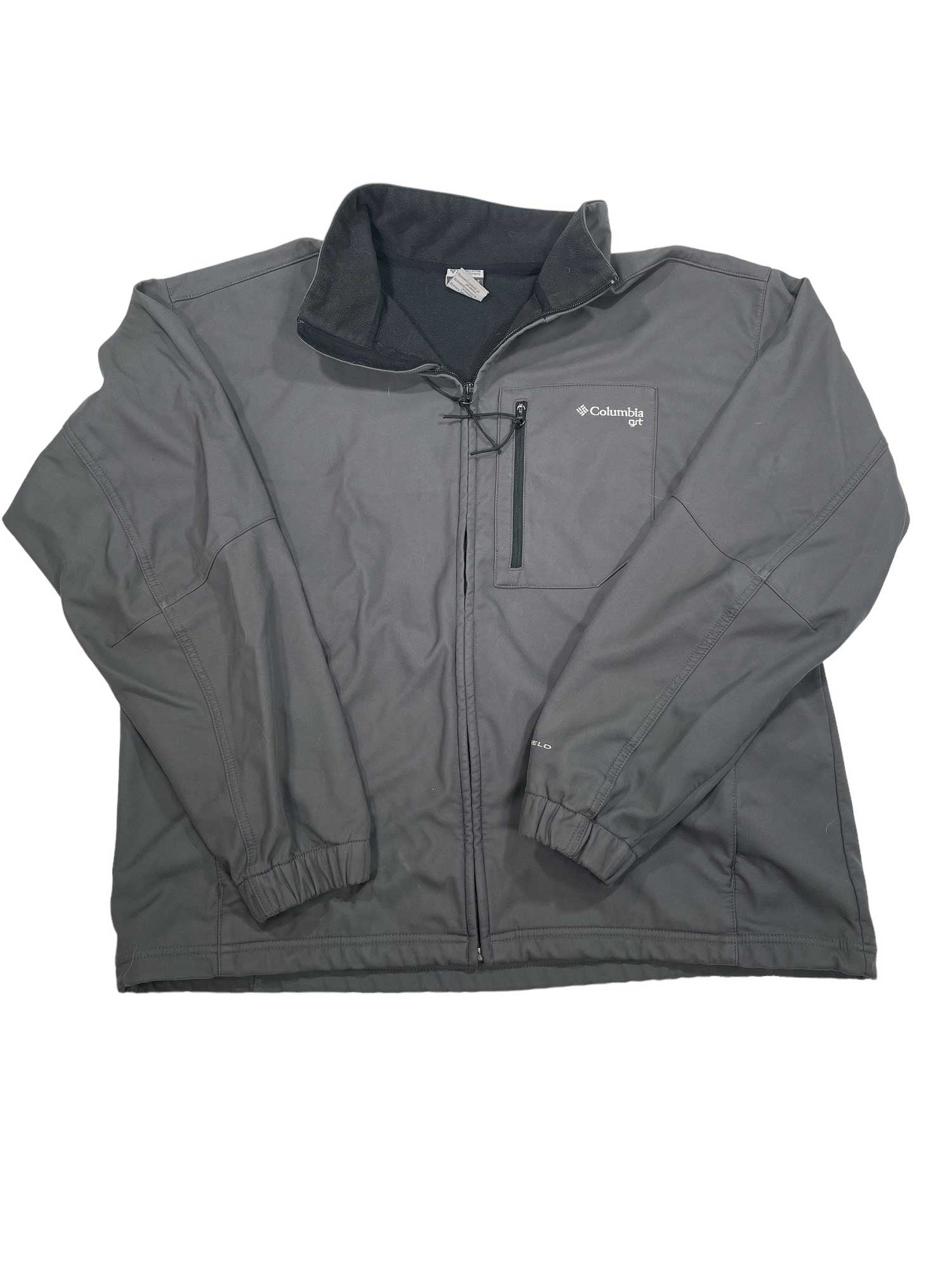 A gray Columbia Ascender Softshell Jacket for men with a zippered front, chest pocket, elastic cuffs, and stand collar lays flat on a white background. This jacket is wind- and water-resistant.