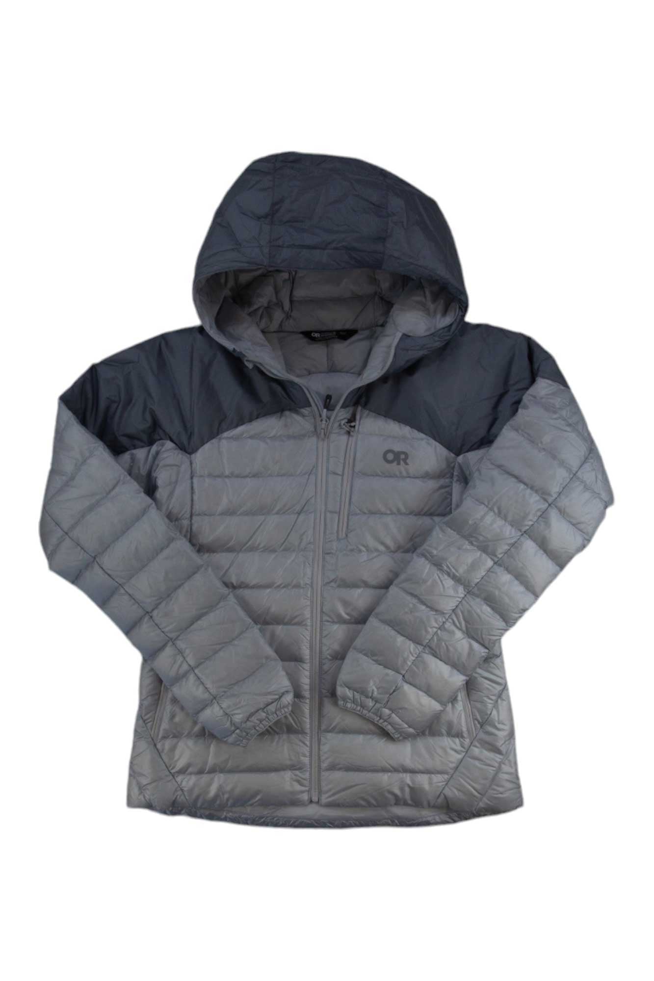 A lightweight, light gray quilted puffer, the Outdoor Research Women's Helium Down Hooded Jacket features 800 fill down, dark gray hood and shoulders, front zipper, chest pocket, and long sleeves—perfect for warmth without bulk.