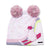 Girls knit ski bunny hat with two pink pom-poms and colorful skiing graphic