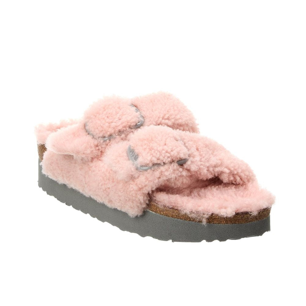 The Birkenstock Papillio Teddy Crystal Rose Arizona Big Buckle Shearling sandal in size 7 features light pink fluffy straps, a cork footbed, and a thick gray sole.