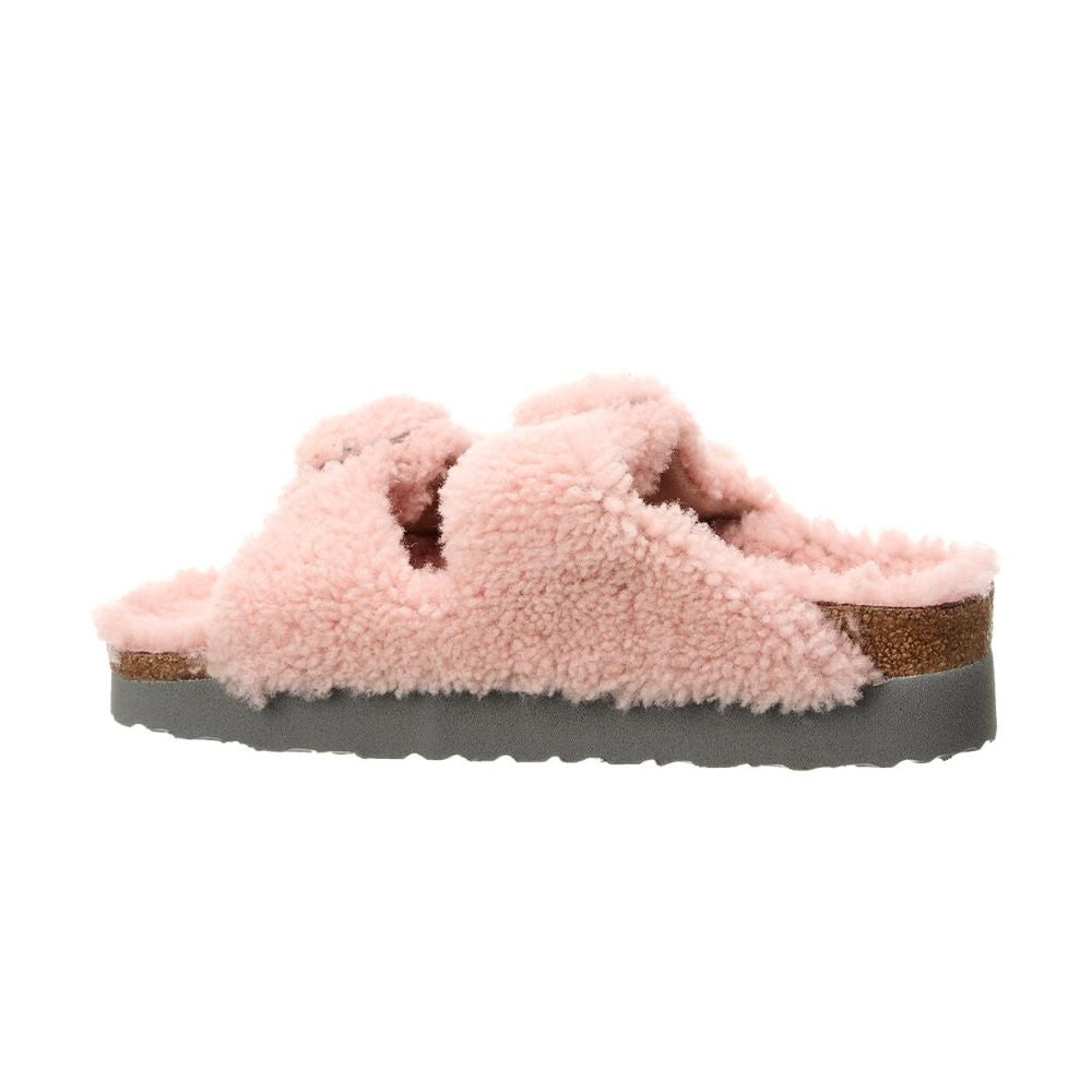 The Birkenstock Papillio Teddy Crystal Rose Arizona Big Buckle Shearling sandal (Size 7) features a fuzzy pink design, two wide straps, open toe, cork-latex footbed, and a thick gray sole.