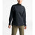 A person in The North Face Women's Outerlands LS Waffle long-sleeve black pullover with a short zip collar and olive-green pants stands against a plain white background.