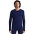 A man with wavy brown hair wears the Icebreaker Men's 200 Zone Seamless LS Crewe in dark blue and matching pants, standing facing forward against a plain white background.