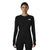A woman stands facing forward, wearing the The North Face Women's Summit Pro 120 Crew— a fitted, long-sleeve black base layer featuring logos on the chest and sleeve—designed for superior moisture management, against a plain white background.