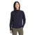 A woman with straight black hair wears the Icebreaker Women's Central II LS Zip Sweatshirt in navy blue and olive green cargo pants, standing with one hand in her pocket against a plain white background.