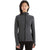 A woman stands facing forward against a plain white background, wearing the Icebreaker Women’s Descender LS Zip Hoody in dark gray with long sleeves and black pants.