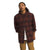 A man with long dark hair wears The North Face Mens Arroyo Flannel Shirt—an organic cotton, long-sleeve plaid button-up—over a white T-shirt and tan pants, standing against a plain white background.