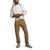 A person wearing a white long-sleeve sweatshirt, The North Face Men's Sprag 5-Pocket Pant, and gray sneakers stands against a plain white background, leaning slightly and looking to the side.