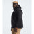 A man stands sideways in The North Face Men's Big Alta Vista Jacket and a tan cap, looking at the camera. He is also wearing tan pants, with a plain light gray background behind him.