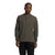 A person wearing The North Face Mens Waffle LS Henley and black pants stands facing forward against a plain white background.
