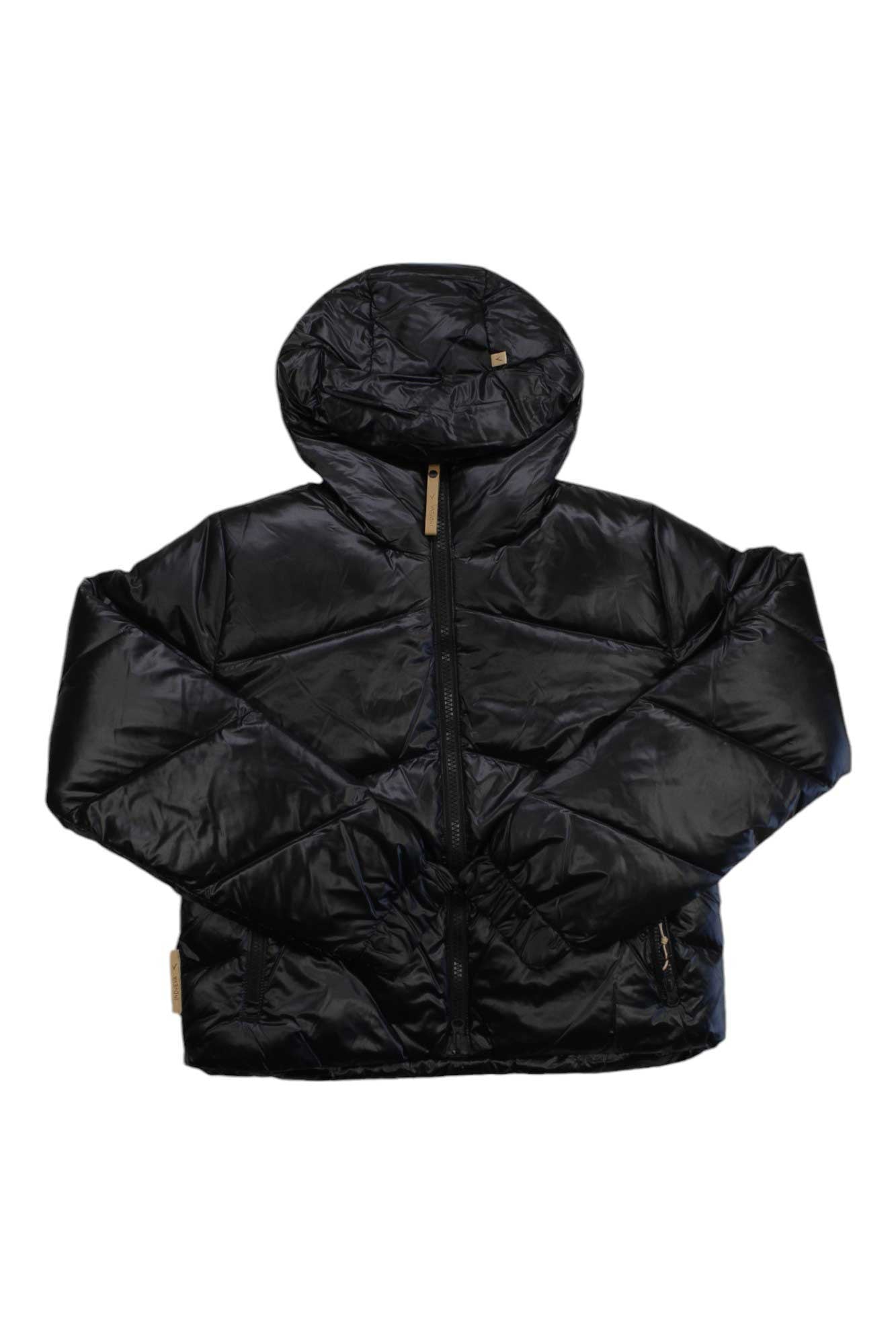 The Indyeva Womens Short Short Hoodie is a shiny black puffer jacket with a hood and front zipper, made from recycled nylon. It features two zippered side pockets, tan zipper pulls, and is laid flat on a white background.