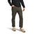 A person wearing a black long-sleeve shirt, The North Face Men's Field 5-Pocket Pant with rolled cuffs, and beige sneakers stands with one hand in their pocket against a white background.
