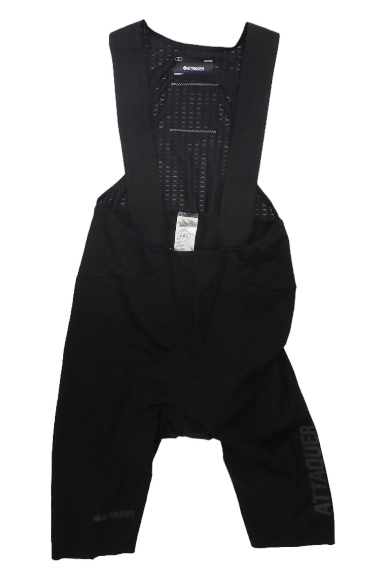 The Heat Map Cycling Race Bib features black bib shorts with wide shoulder straps and mesh upper for comfort, support, and pro-level aerodynamic performance. The ANTIQUE brand is subtly printed on the left leg.