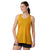 A woman in a sleeveless yellow Smartwool Womens Merino Sport 120 Racerback Tank and black shorts stands smiling, looking slightly to her left against a plain white background.