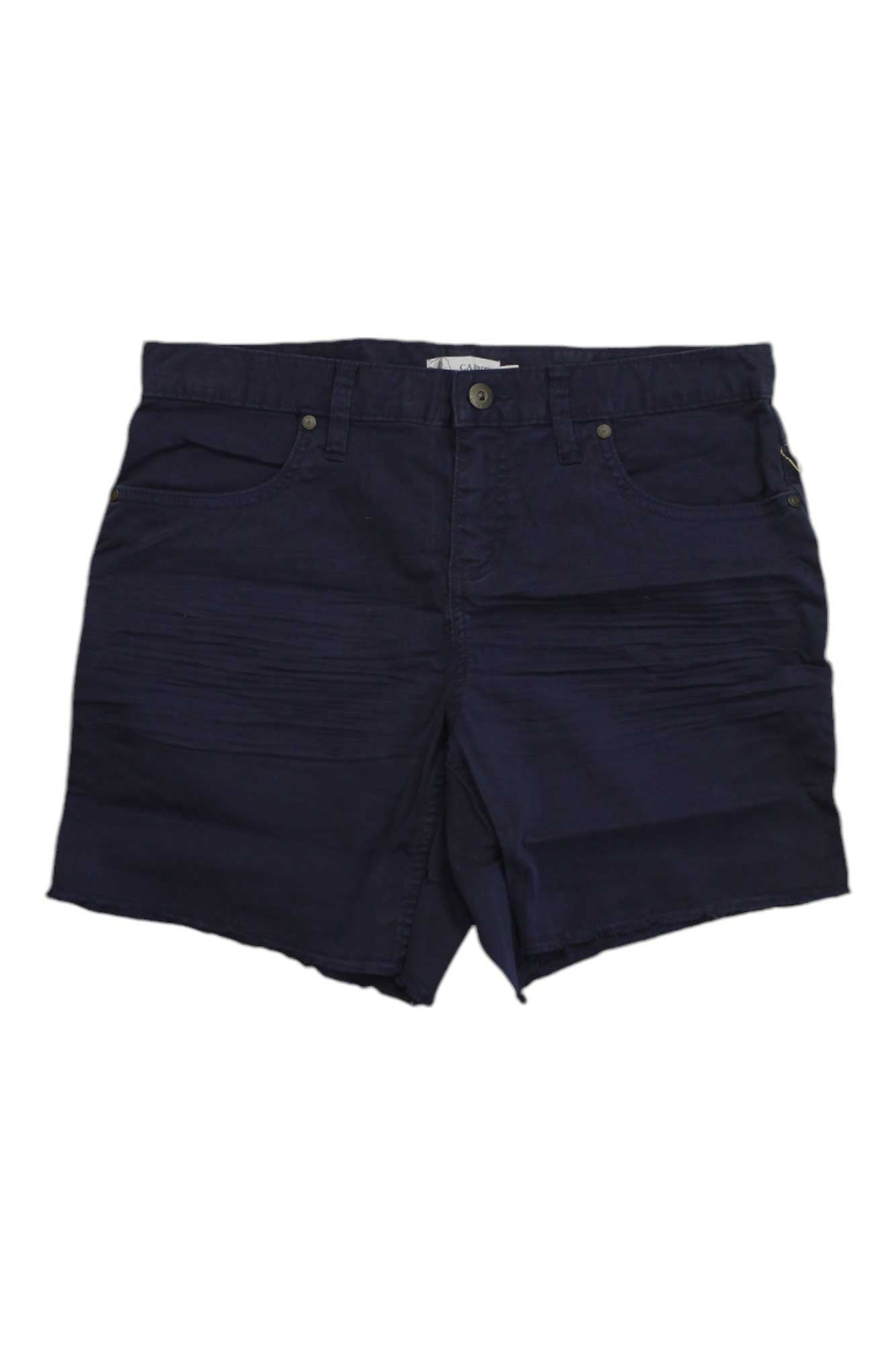 The Carve Designs Womens Oahu 6 Inch Twill Short in dark navy features front pockets, belt loops, button closure, and UPF 50+ sun protection—ideal outdoor shorts for women, shown on a white background.