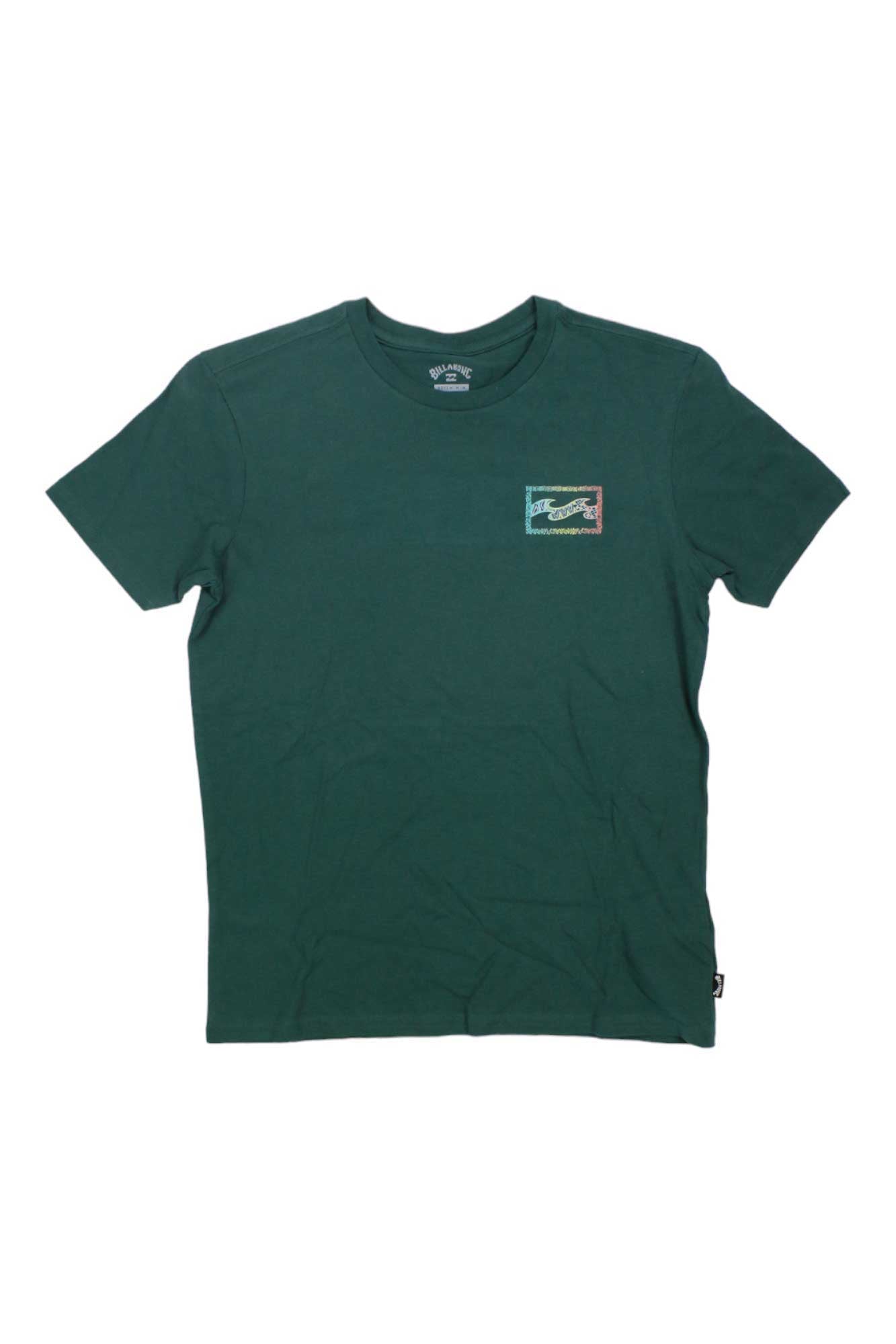 The Billabong Boys Crayon Wave SS T-Shirt is a dark green, 100% cotton tee with short sleeves and a small, colorful graphic patch on the left chest.