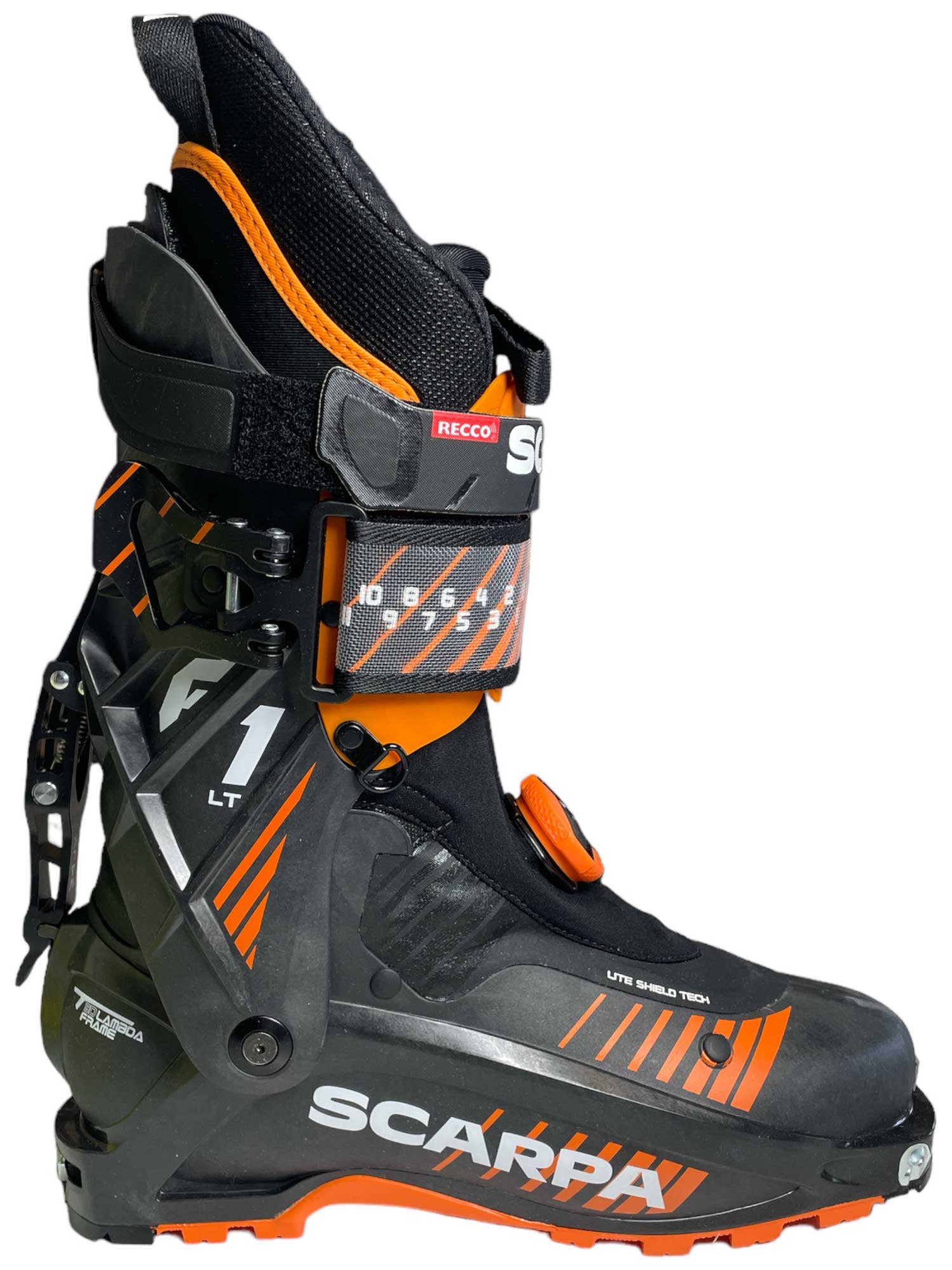 Ski boot with orange-striped panels, RECCO badge, black shell and buckles
