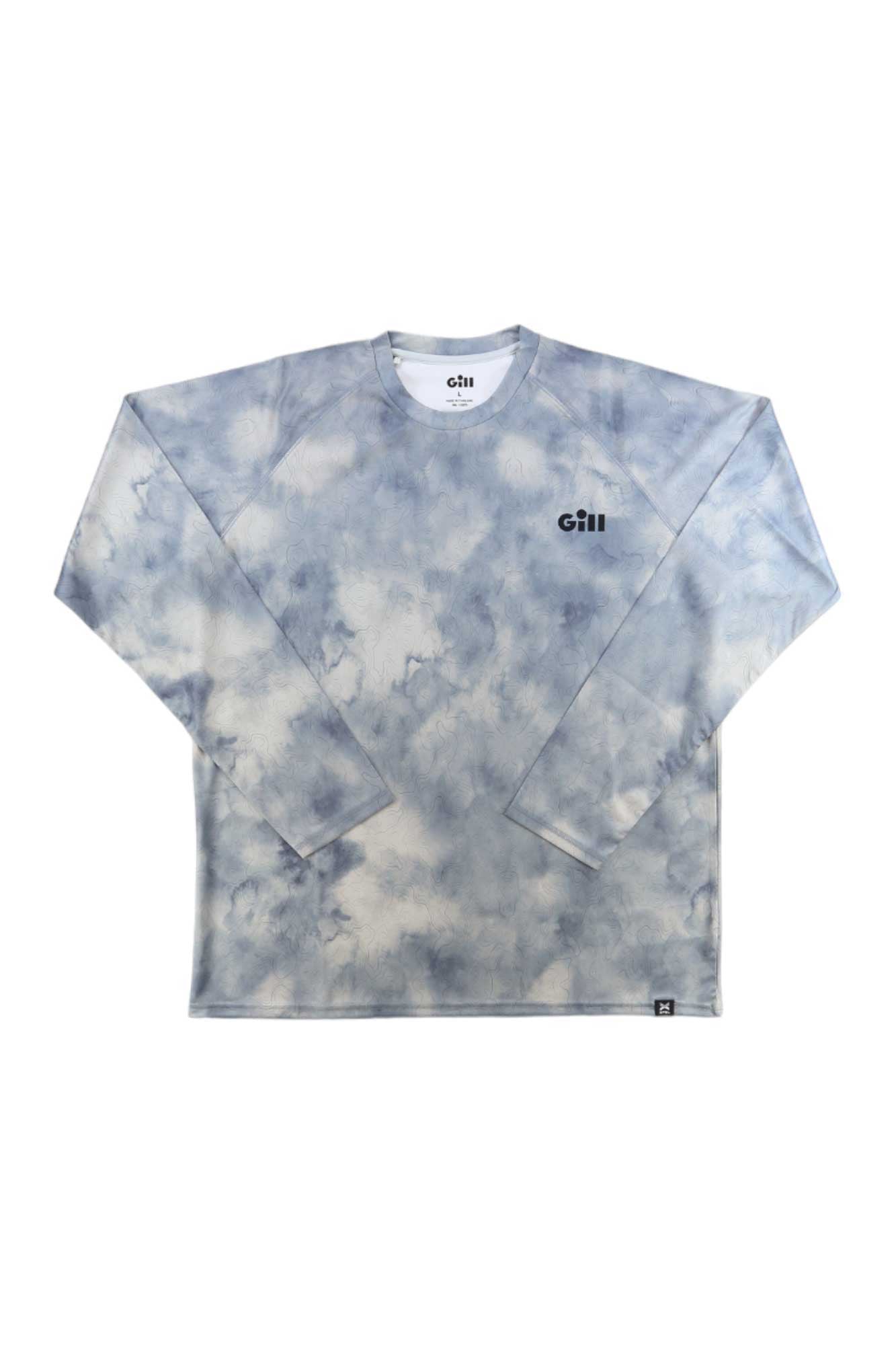 The Gill Mens Xpel Tec LS Top is a sun-protective, long-sleeve fishing shirt with a blue and white tie-dye pattern and "Gill" printed in black on the left chest.