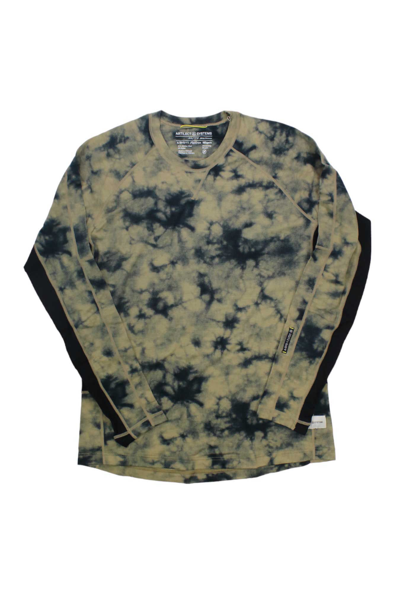 The Artilect Mens Flatiron 185 TD Crew Top is a long-sleeve, V-neck tie-dye shirt in black and beige, with visible collar and hem tags. Made from moisture-wicking fabric, it's ideal for multisport use. Shown laid flat on a white background.