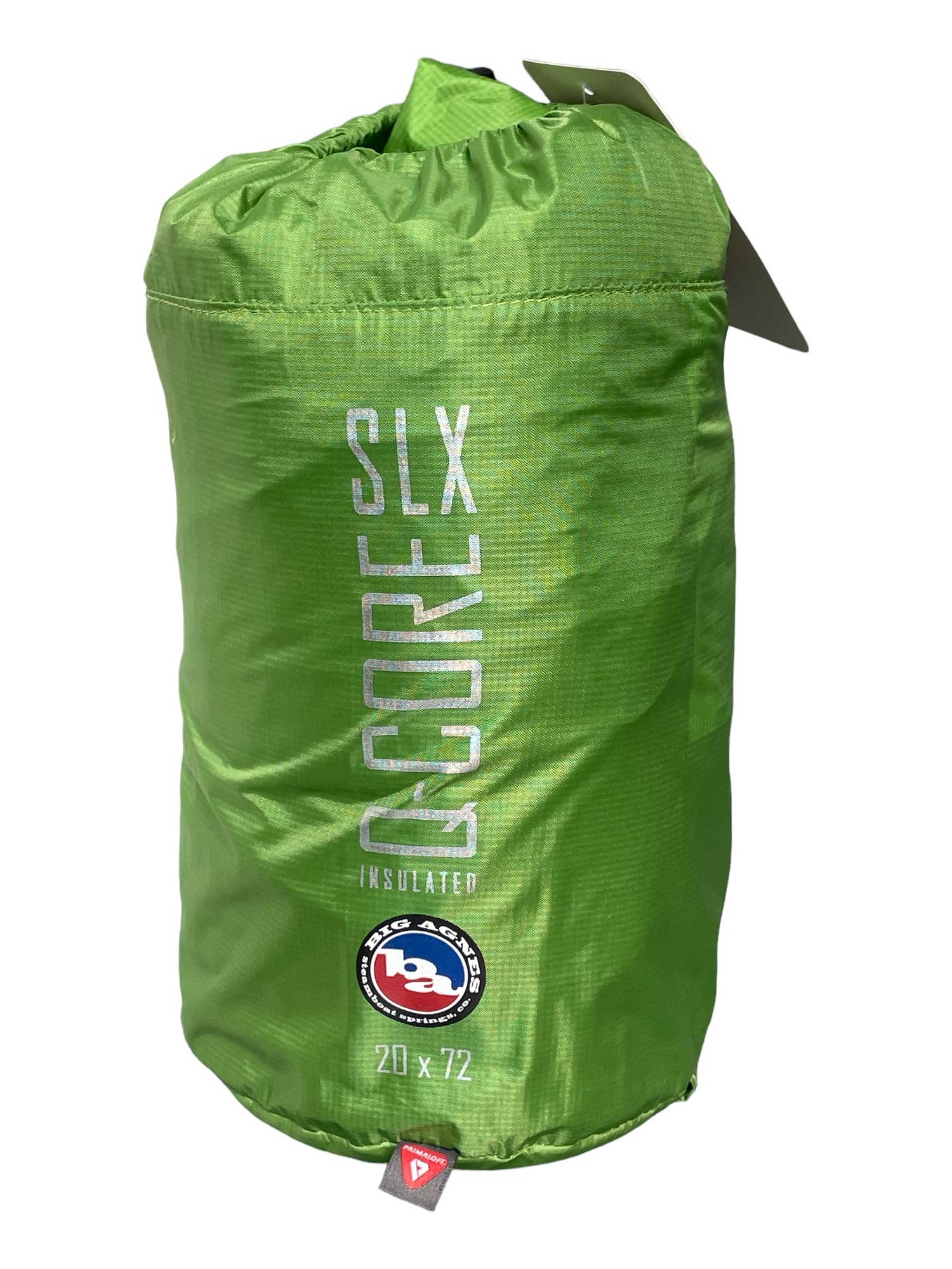 A green, cylindrical stuff sack displays "Insulated Q-Core SLX" and the Big Agnes logo in white. The size 20 x 72 at the bottom highlights this ultralight sleeping pad.