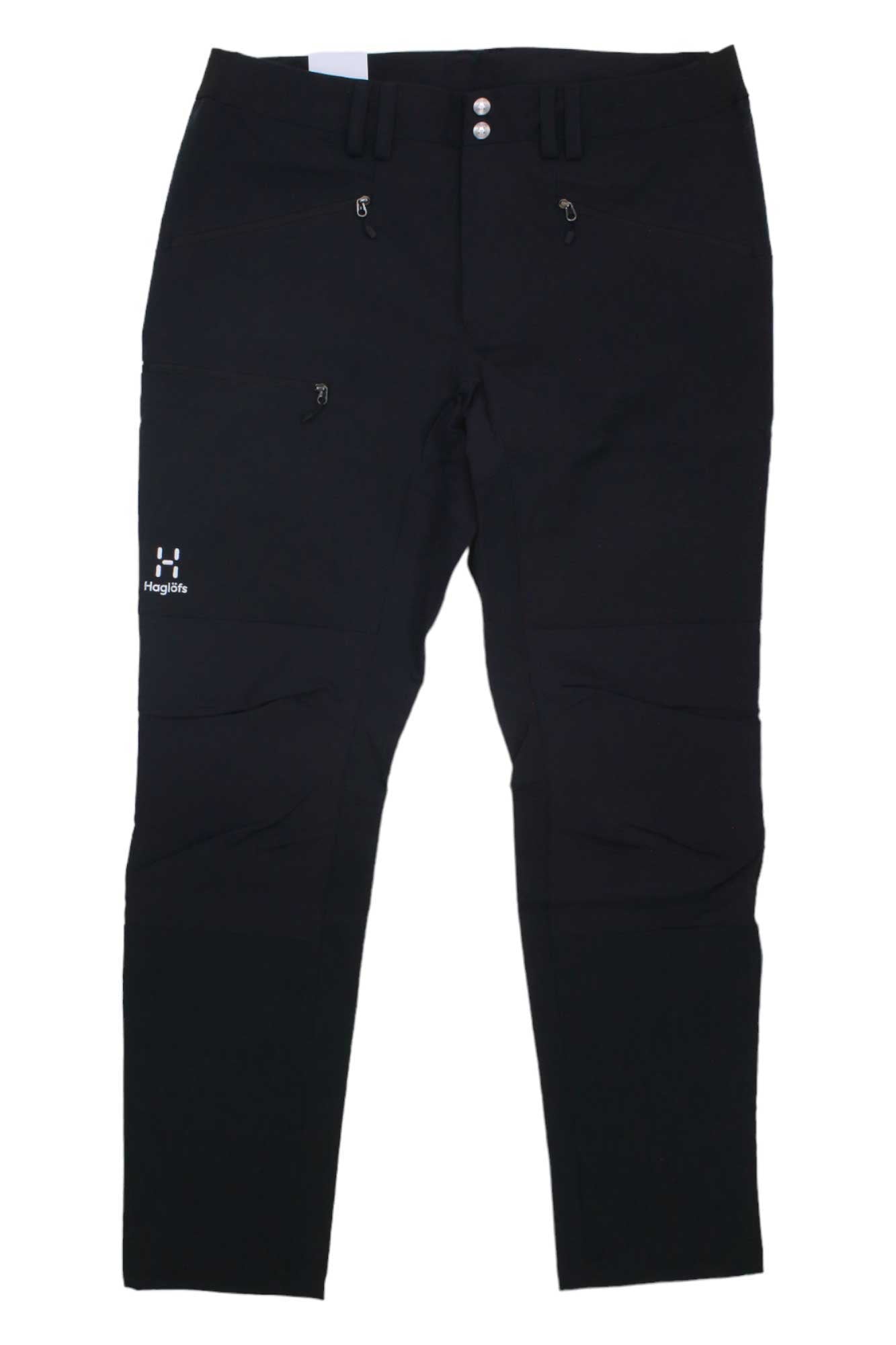 A pair of Haglofs Mens Mid Slim Pant in black, made from recycled material with zippered pockets, button closure, and belt loops, shown on a white background.