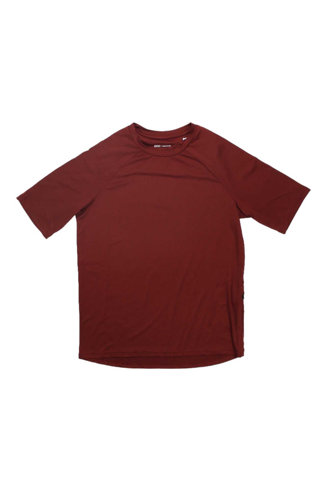 The POC Sports Womens Reform Enduro Light Tee is a plain, short-sleeved maroon shirt with moisture-wicking fabric, laid flat on a white background—ideal as a women’s cycling tee.