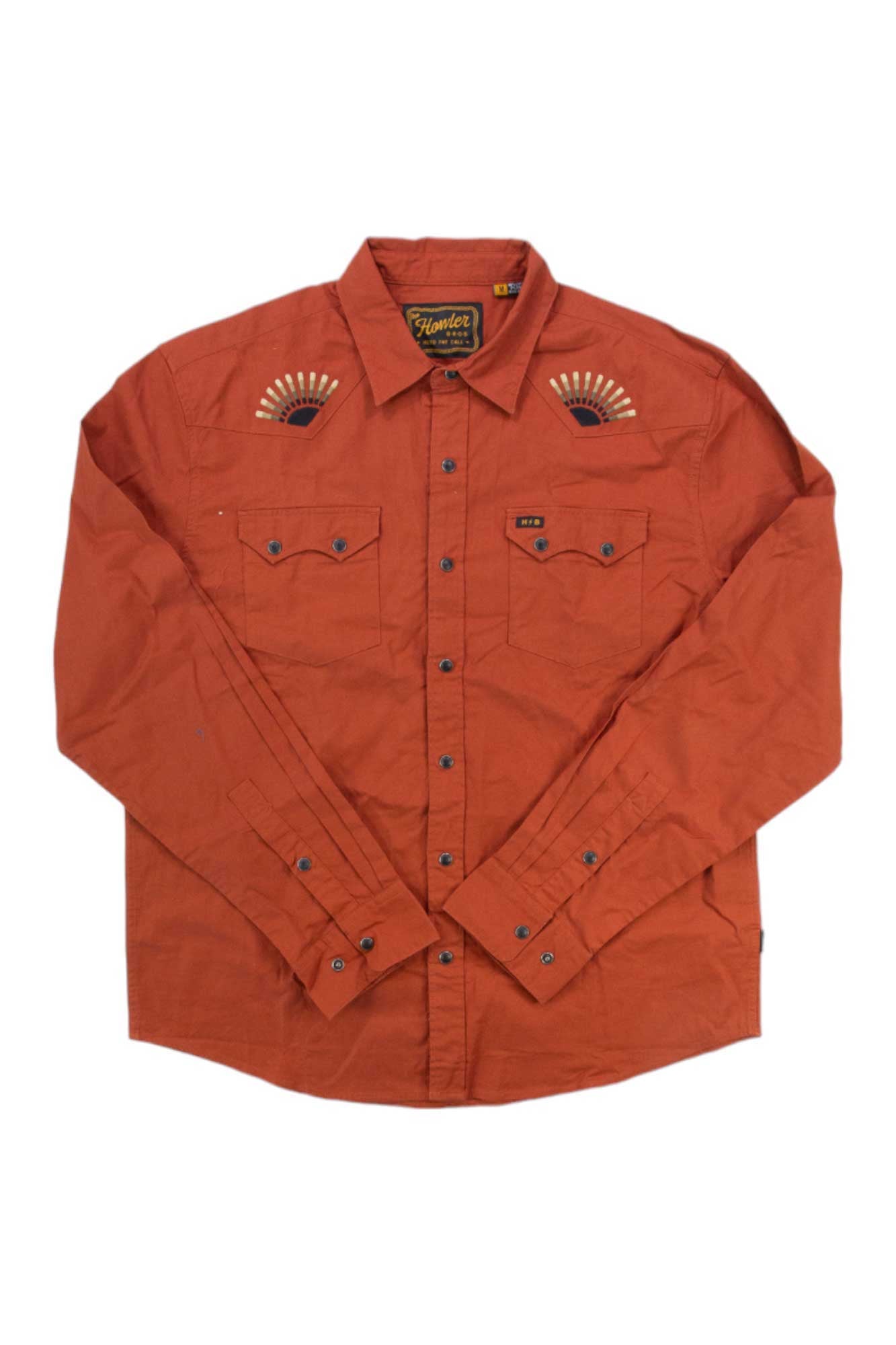 Rust red snapshirt with button front, chest pockets, and fan-style embroidered accents