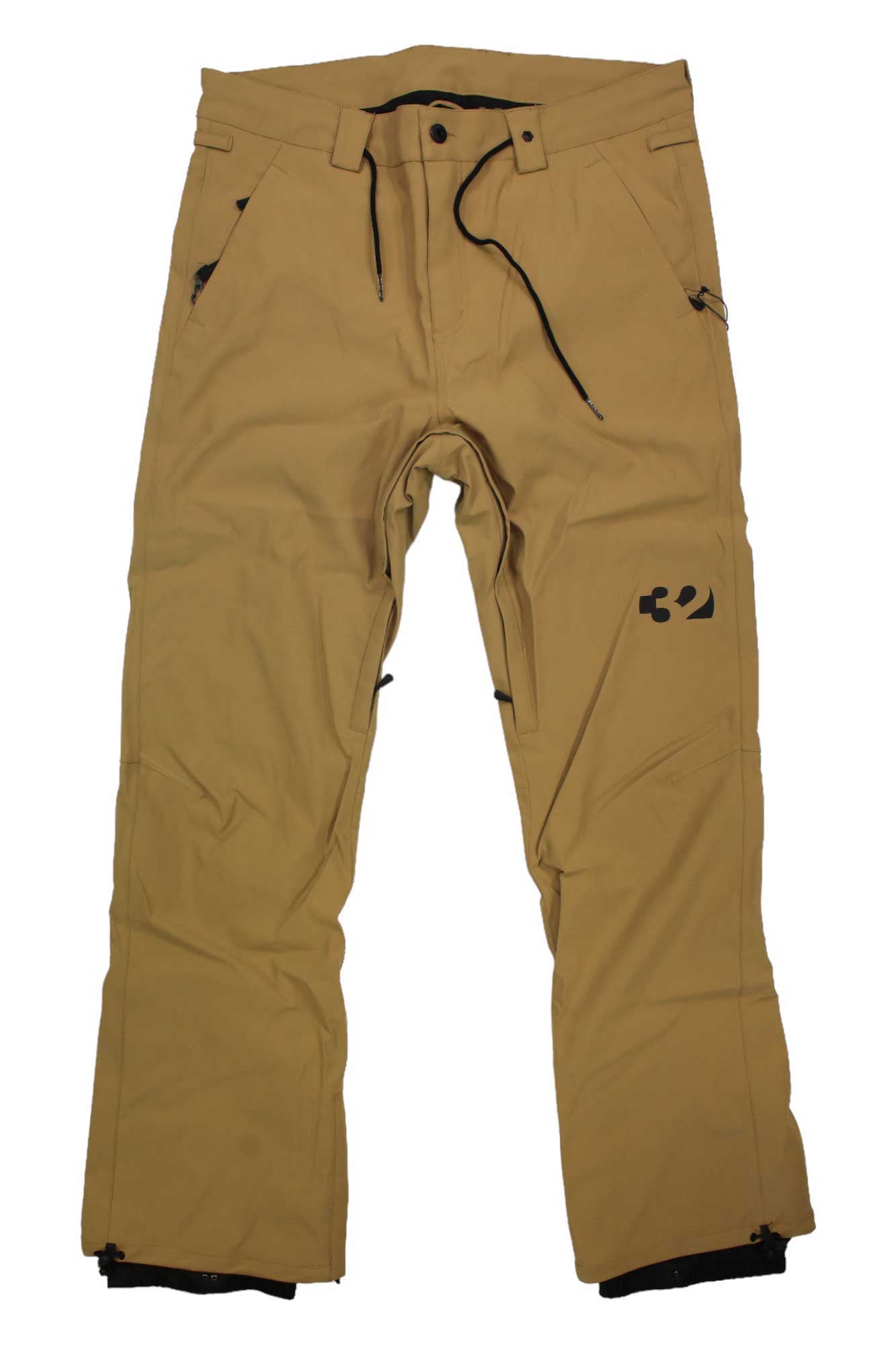 A pair of ThirtyTwo Mens Wooderson Pant in tan, made from recycled polyester, with black drawstrings, front pockets, and a small black logo on the left thigh, is laid flat on a white background.