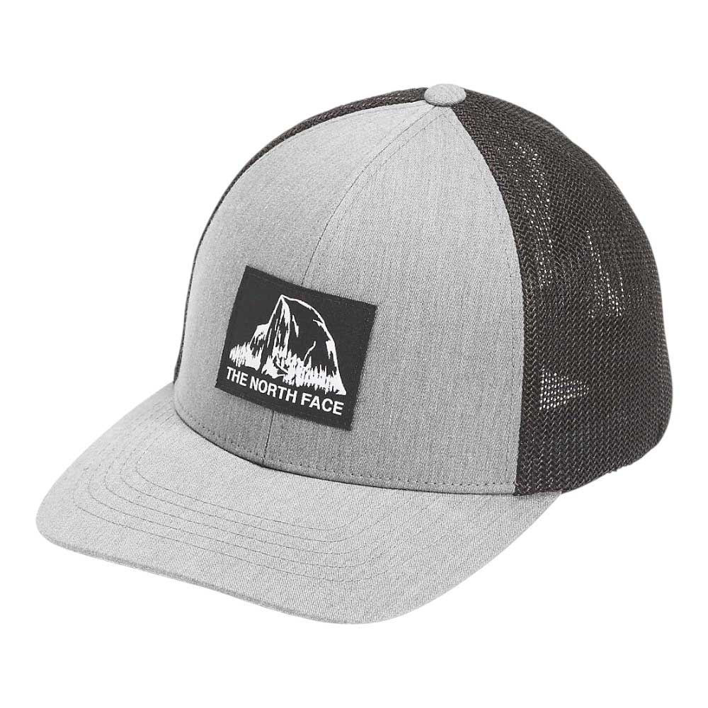 The North Face Truckee Trucker Hat is a gray and black outdoor cap with a mesh back and a front patch featuring The North Face logo and mountain graphic, designed for all-day comfort.