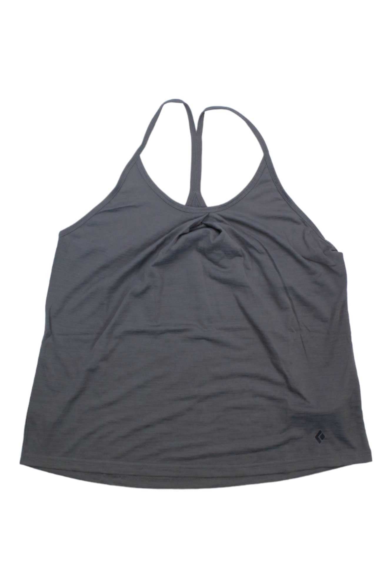 The Black Diamond Womens Integrale Tank is a dark gray top with a loose racerback fit, front-gathered detail, small hem logo, and quick-dry moisture-wicking fabric for all-day comfort.