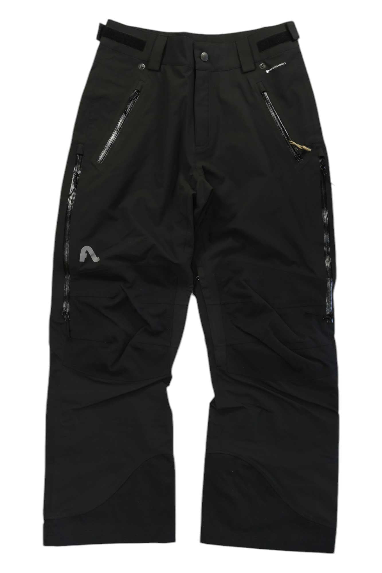 The Flylow Mens Chemical Pant is a pair of black, durable snow pants featuring multiple zippered pockets, belt loops, and a small reflective logo on the left thigh, displayed on a white background.