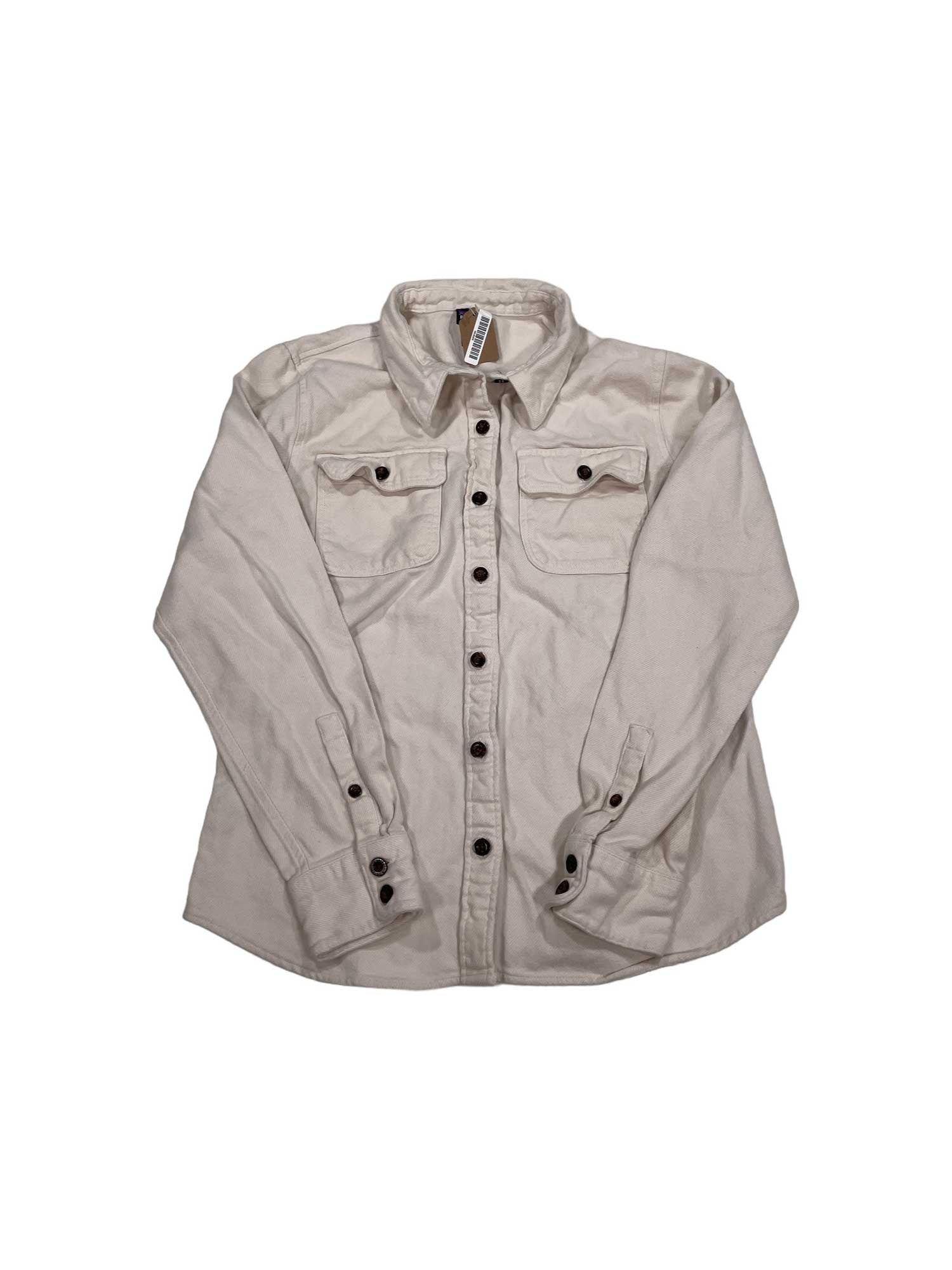 The Womens Long-Sleeved Fjord Flannel Shirt by Patagonia is a beige button-up with black buttons, two front chest pockets, and made from soft organic cotton flannel, shown laid flat on a white background.