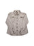 The Womens Long-Sleeved Fjord Flannel Shirt by Patagonia is a beige button-up with black buttons, two front chest pockets, and made from soft organic cotton flannel, shown laid flat on a white background.
