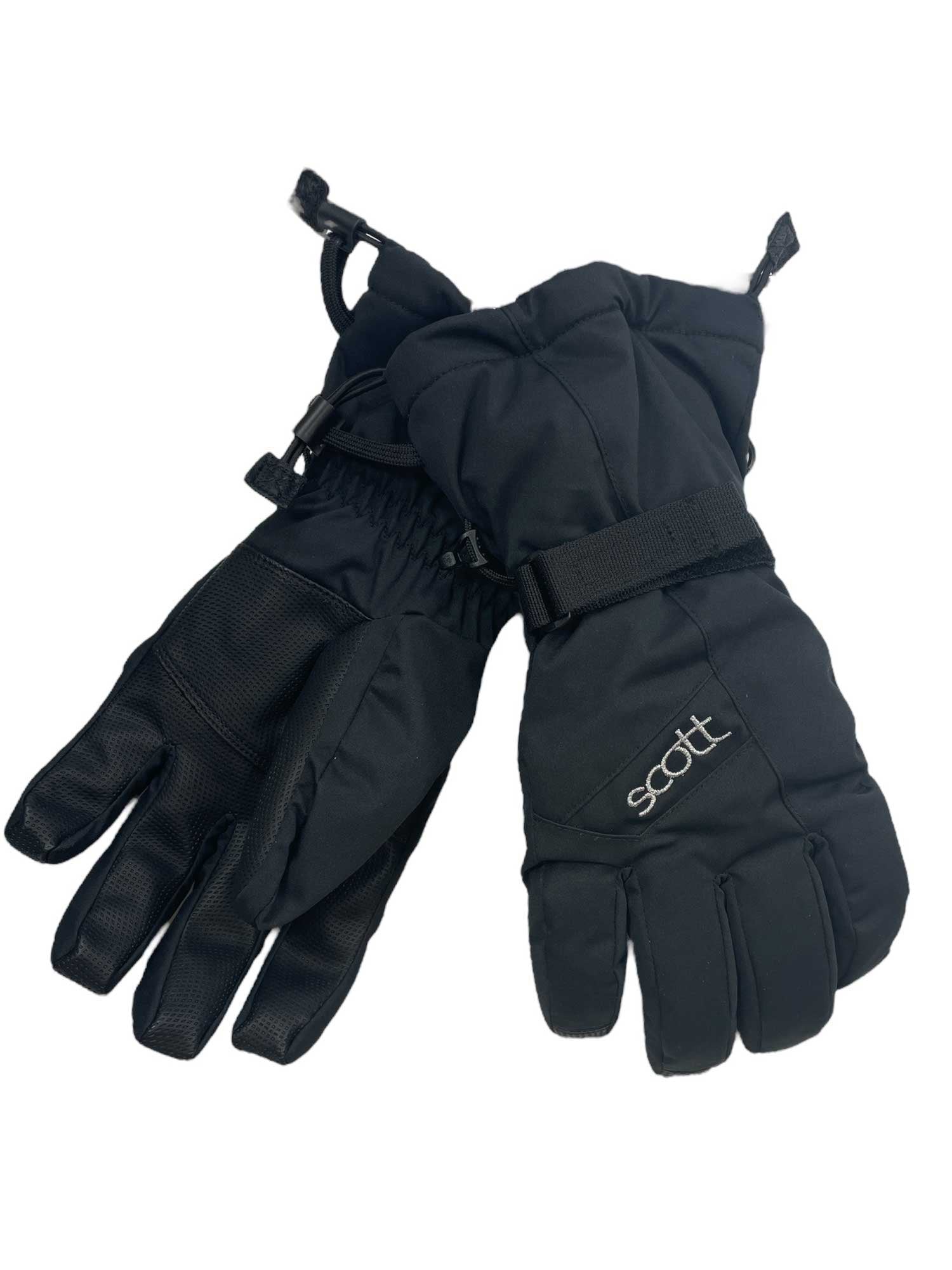 The Scott USA Womens Ultimate Warm Glove, a black waterproof insulated skiing glove with adjustable wrist straps and "Scott" printed on the back, is shown overlapping on a white background.