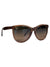 Maui Jim Glory Glory Polarized Sunglasses in brown feature semi-transparent cat eye frames, scratch-resistant lenses, and a subtle logo on the top left of the left lens, displayed against a plain background.