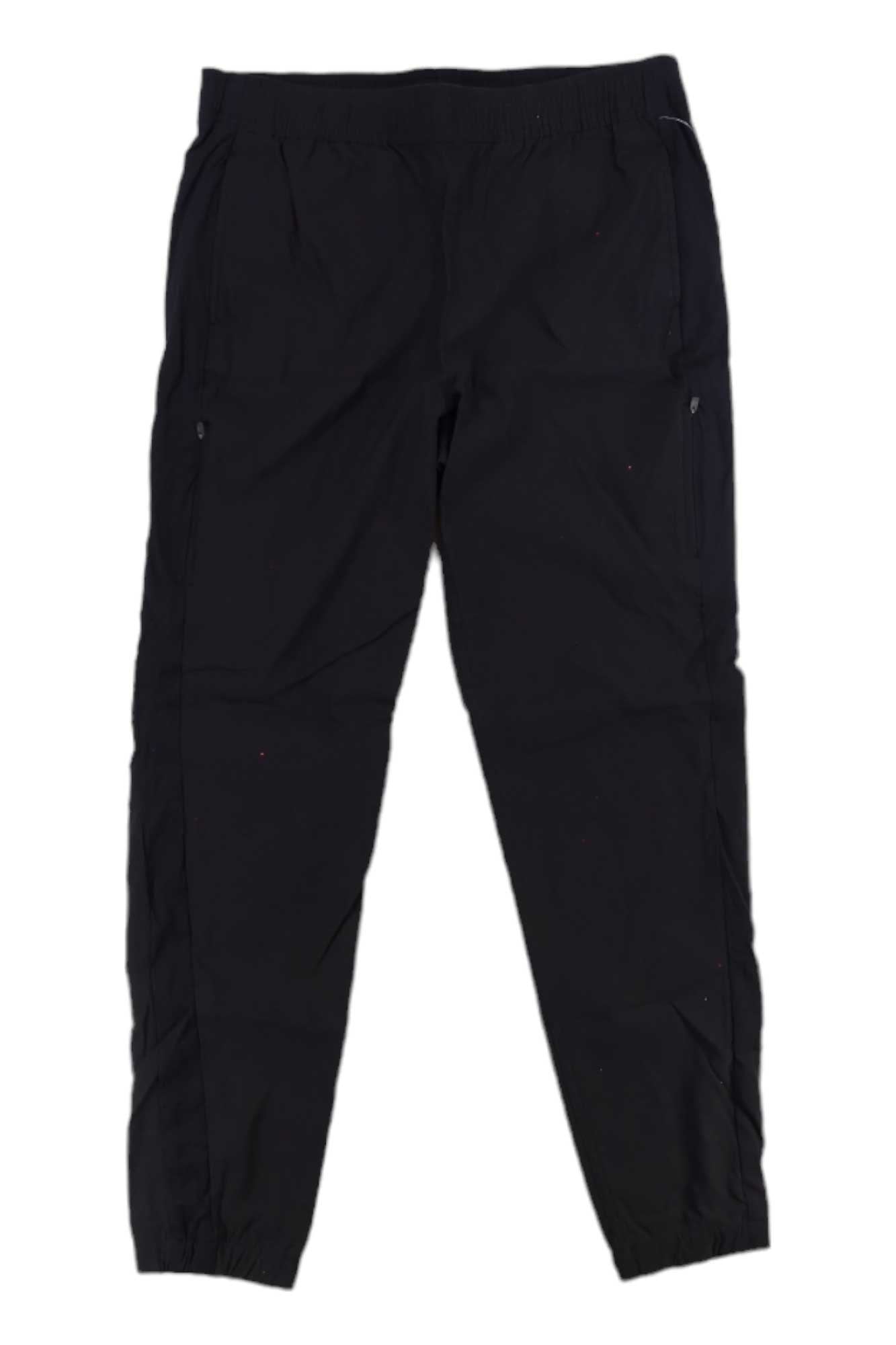 The Eddie Bauer First Ascent Women's Guide Jogger, featuring elastic cuffs, side pockets, and a relaxed fit in black, is shown laid flat on a white background.