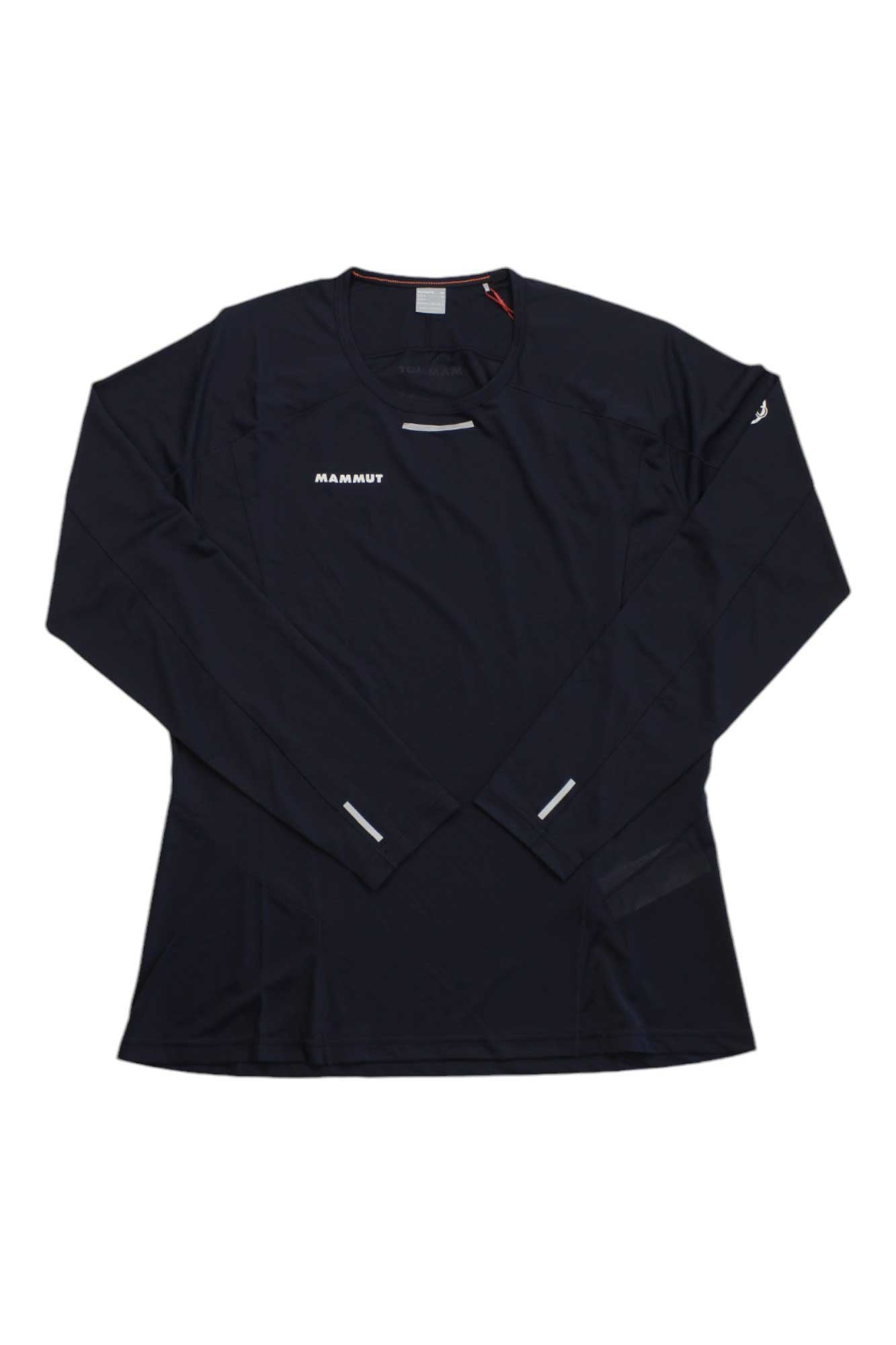 The Mammut Womens Aenergy FL LS Top is a lightweight black long sleeve shirt made from recycled polyester, featuring moisture-wicking comfort, a crew neck, subtle reflective sleeve details, and "MAMMUT" on the front left chest.