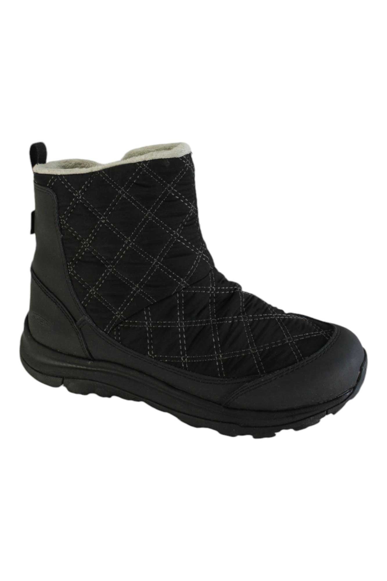 The KEEN Women’s Terradora II Wintry Pull-On Waterproof Boot is a black, ankle-high insulated boot with quilted stitching, a thick rubber sole, pull tab, and light lining for warmth—perfect for winter.