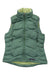 The Womens Down Vest features a green color, front zipper, two zippered side pockets, stand-up collar with light green lining, eco-friendly lightweight warmth, and a Patagonia logo tag on the lower front.