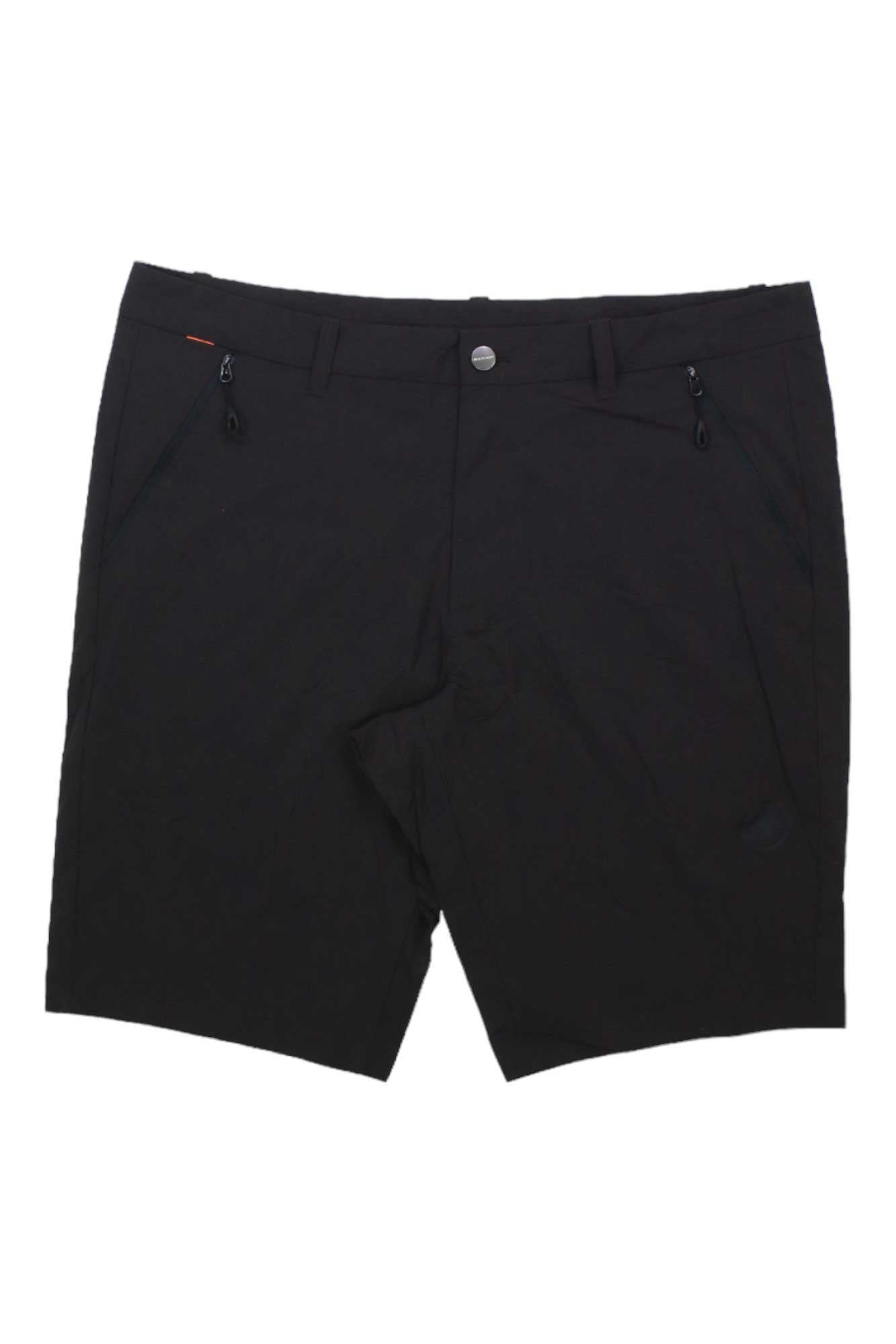 The Mammut Men's Hiking Short in black features front pockets with zipper closures, belt loops, and a button waist. These quick-drying shorts are shown laid flat on a white background.