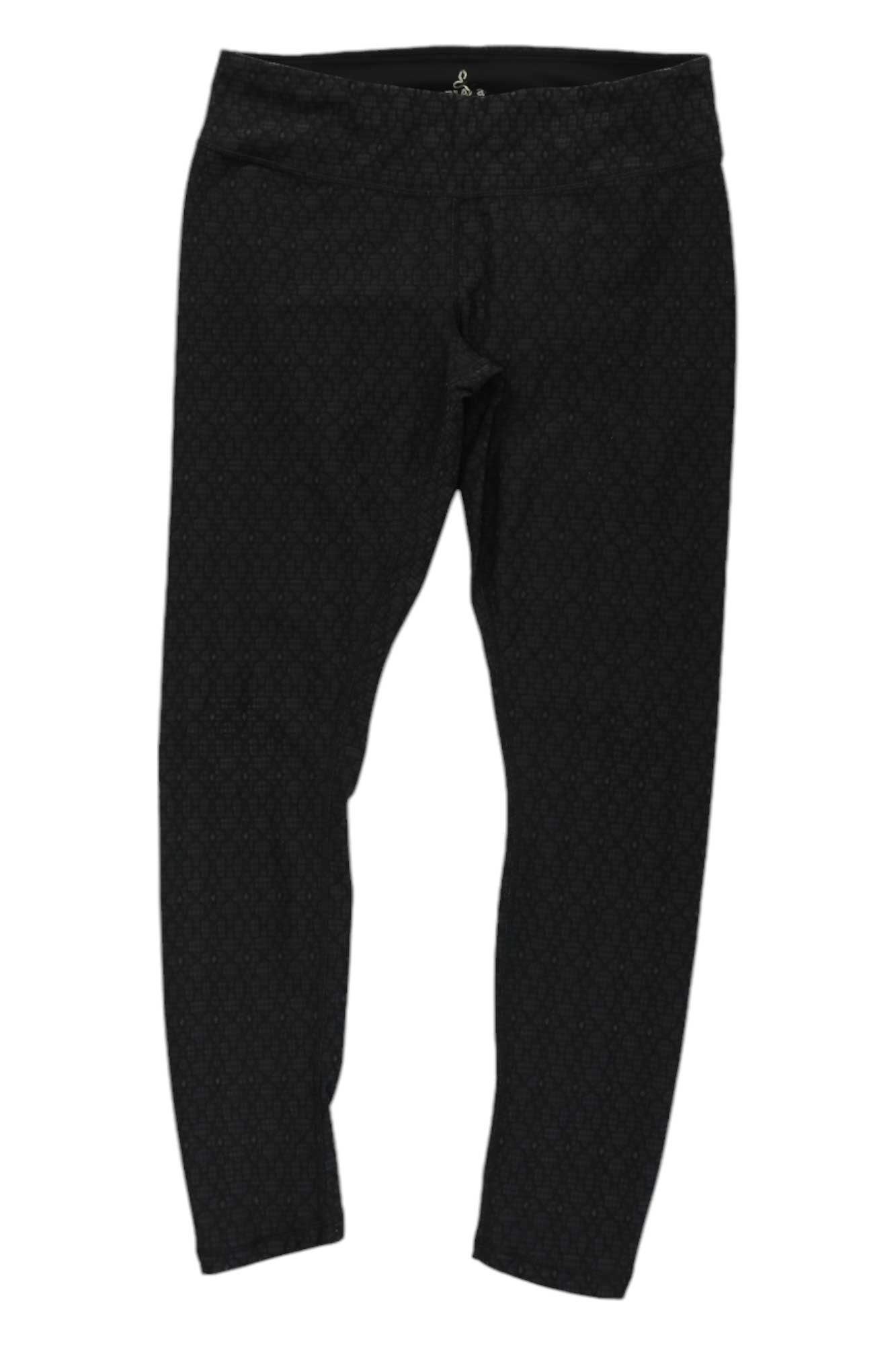 The Prana Womens Misty Yoga Leggings in black feature a subtle textured pattern and a wide waistband, shown laid flat on a white background.