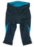Laid flat on a white background, the Womens Sugar Knicker features black and blue padded cycling shorts with three-quarter length legs, Sensor fabric, a women’s-specific chamois, blue inner lining, and side panels.