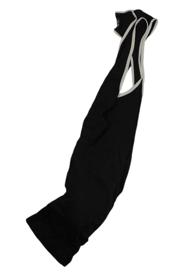 A sleeveless black dress with white trim details, shown on a white background—evoking the sleek, modern style found in Mens Bib Shorts and high-end men's cycling apparel.