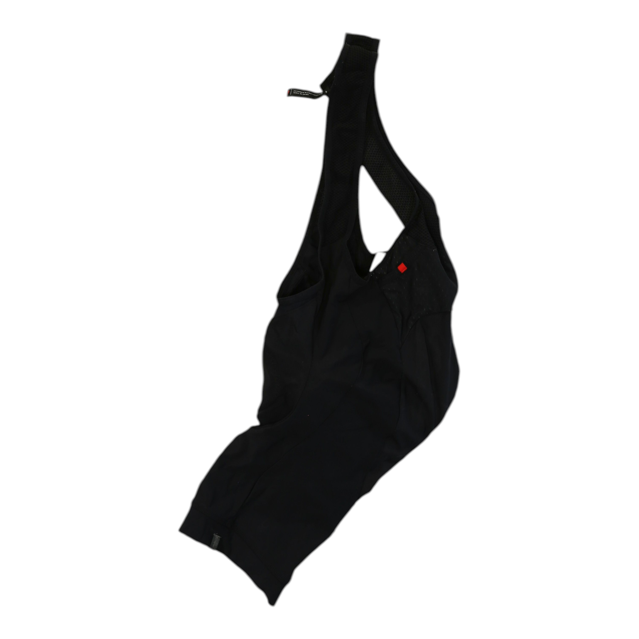 Black cycling bib short, side view, with small red logo on chest